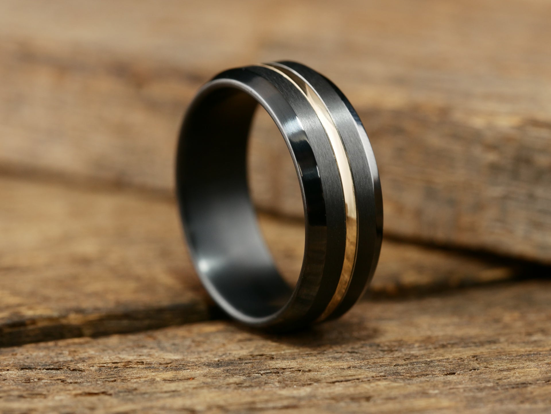 Black Titanium and Rose Gold wedding band with teak wood inside